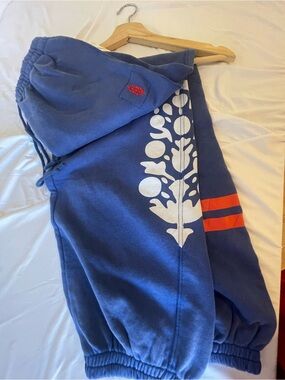 Free People women Navy Sweatpants with White Graphic and Red Stripes